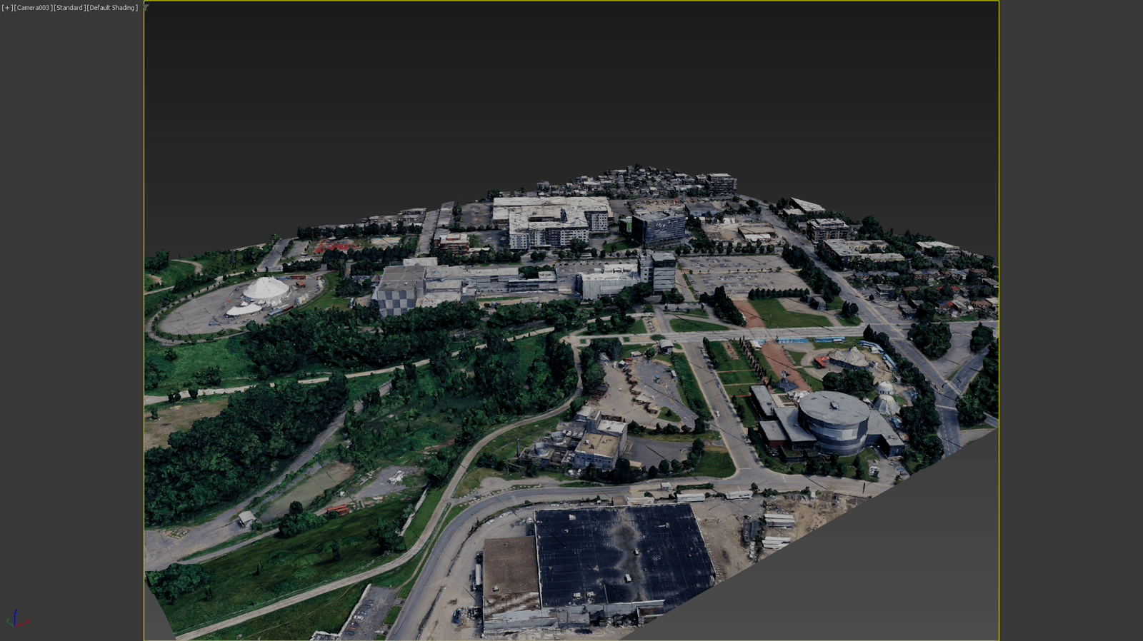 A photorealistic capture imported into the 3ds Max viewport, seen from above the site.